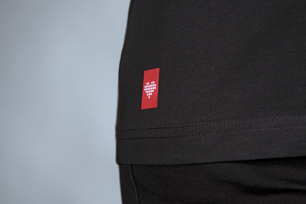 joyclub_badge_on_black_shirt